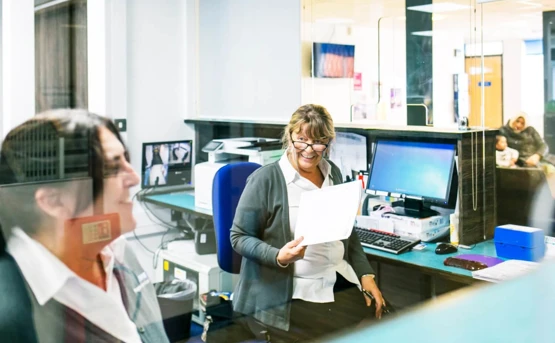 Receptionists in a healthcare centre reception